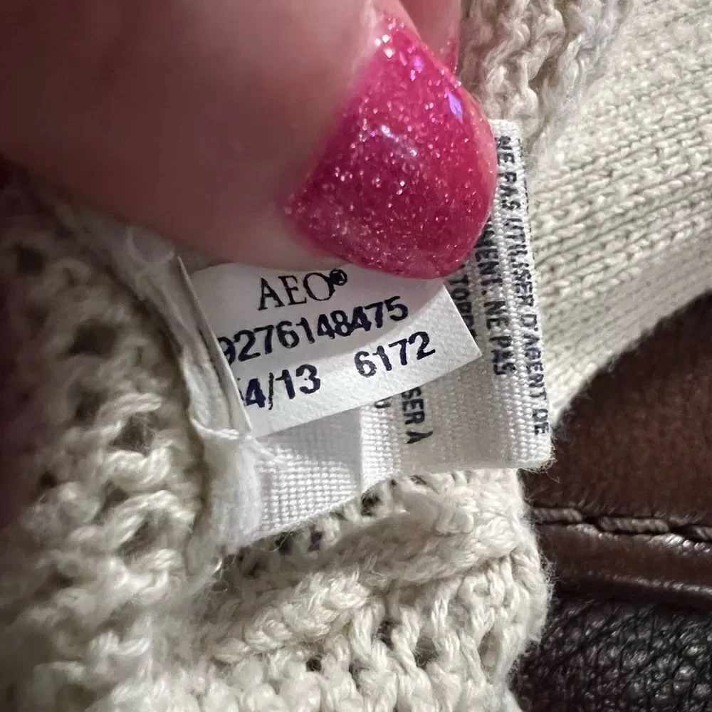 American Eagle zip up cream colored sweater size large